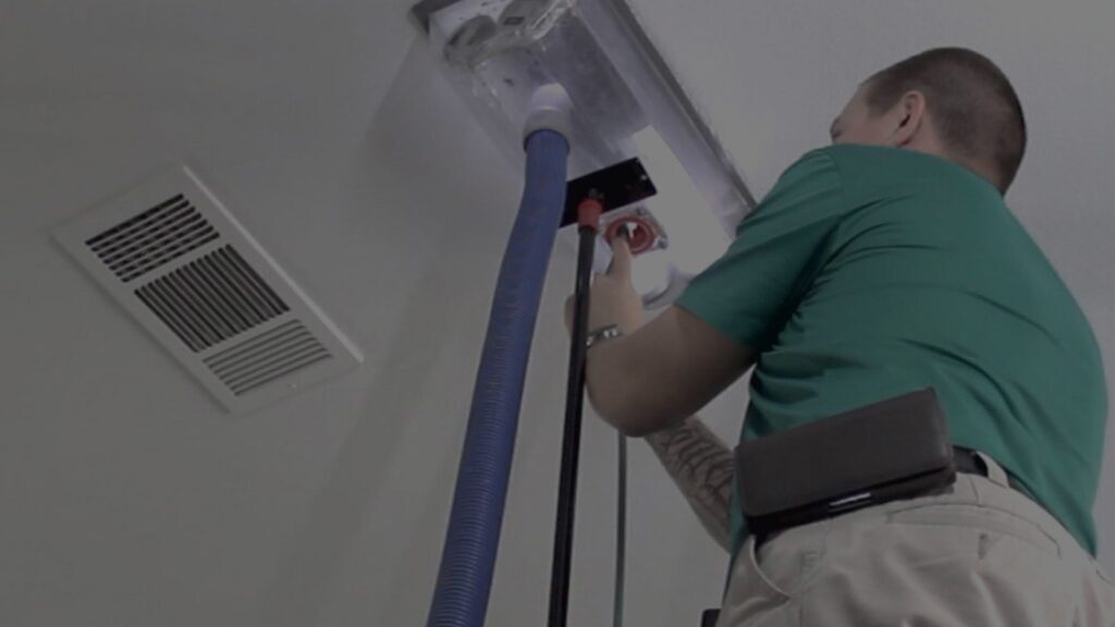 Performing air duct cleaning, a process that involves cleaning various components of a forced air heating and cooling system.